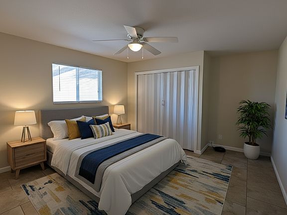 Bedroom 1 staged. Wide angle.
