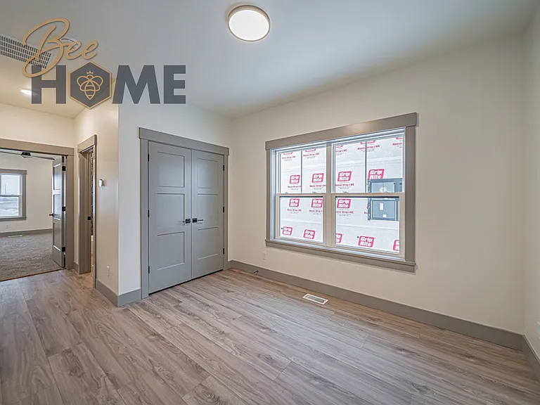 Upstairs hallway, with laundry room doors
