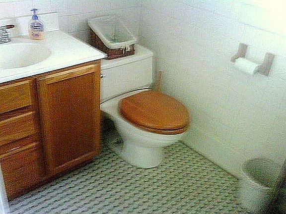 Upstairs Full Bath, an additional 1/2 bath is on the Main Floor