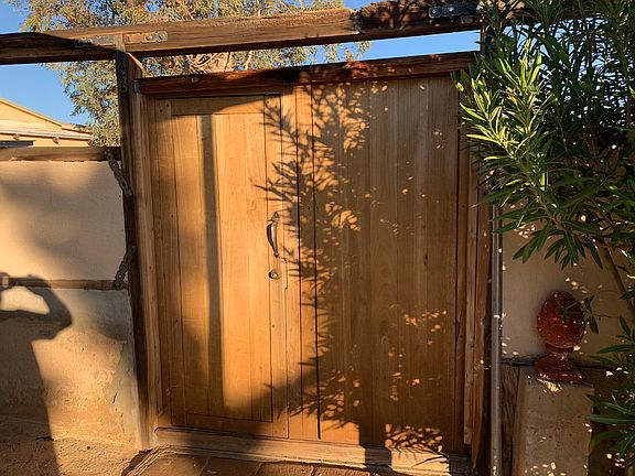 Everyday gate in carport