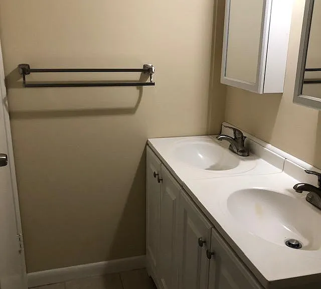 Master bedroom bathroom, new bathtub and new vanities