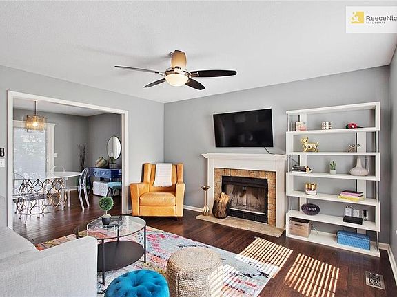 Relax in your updated and hip living room - beautiful hardwoods and new windows too!