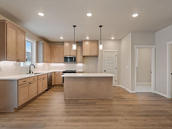 7124 S Hyton ST by Aho Construction