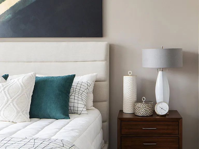 Oversized Bedroom with Padded Headboard and Designer Throw Pillows