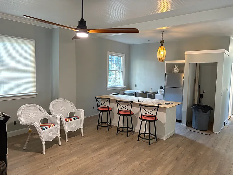 Full size w/d will go in the cubby to right of frig. Slide in stove will go in the island.