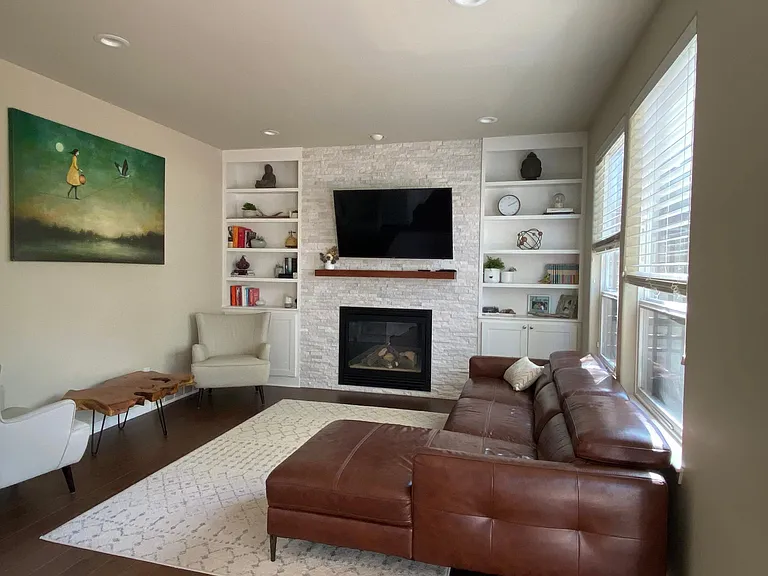 Remodeled family room with lots of storage and expensive finishes