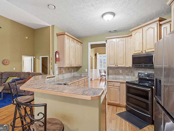 3rd image of 8866 Camp Tree Ct