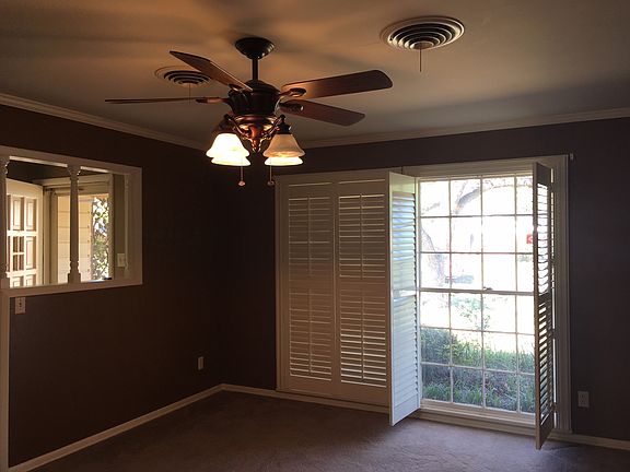 Dining rm with shutters open