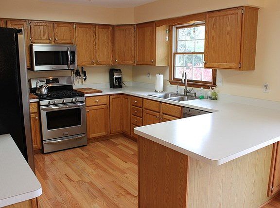 "Island" overhang with room for barstools.