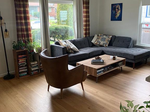 Opposite view of the spacious, well lit living area