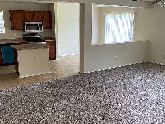 Living room leading to kitchen area
