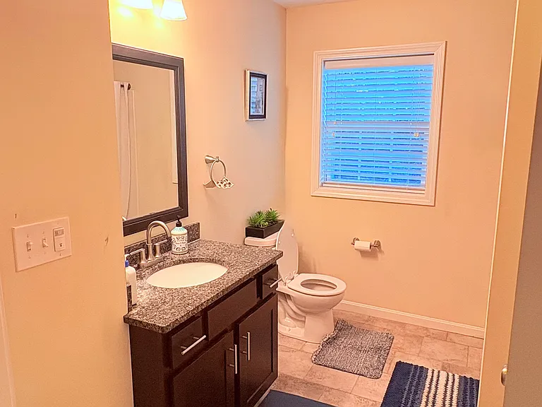 full bathroom at the second level with bathtub