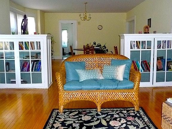 Living room with view to dining room & kitchen
