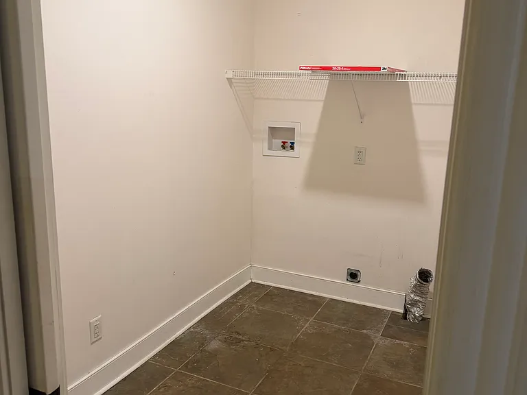Downstairs apt laundry room
