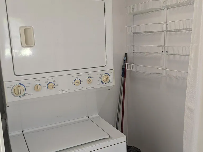In unit washer/dryer with storage for laundry or kitchen.