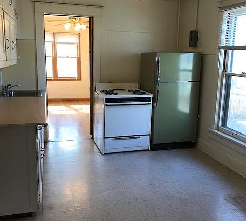 Large kitchen with lots of floor space.