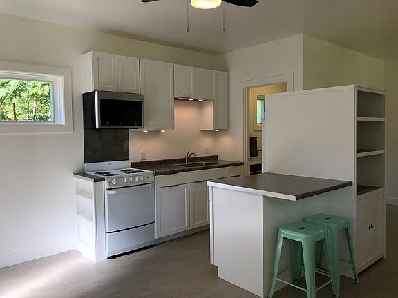 Kitchen with bar seating.