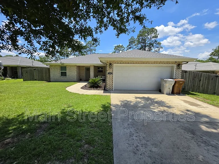 5565 Riviera Dr — Photo 1