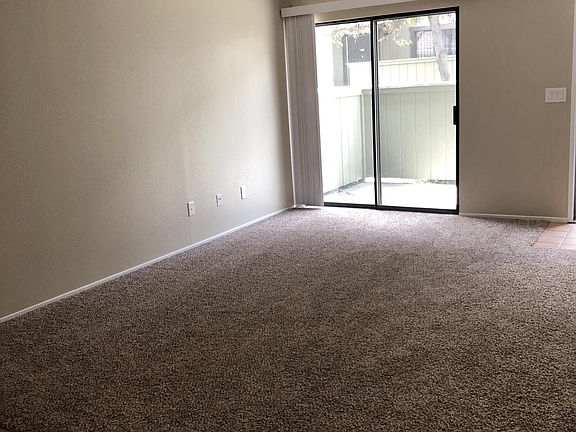 Living room with sliding door to patio