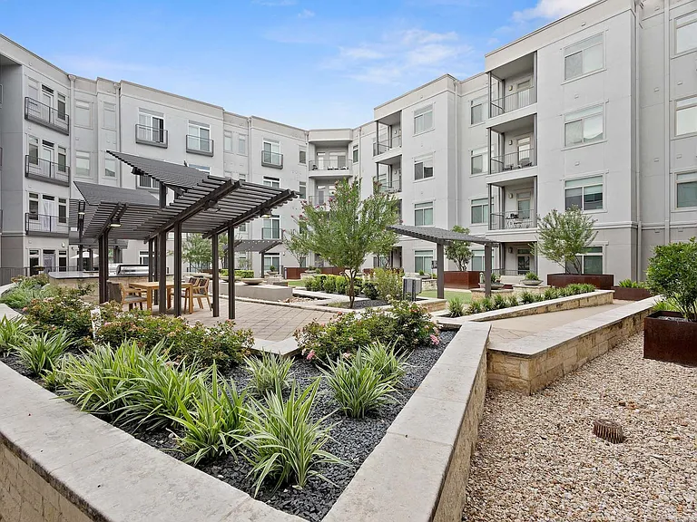 Relax, recharge, and connect in a courtyard designed for the way you live today