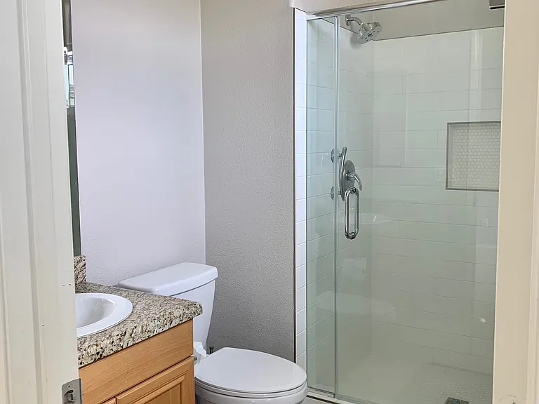 Toilet and vanity in ensuite bathroom