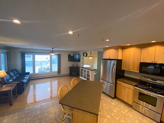 Kitchen and living room.