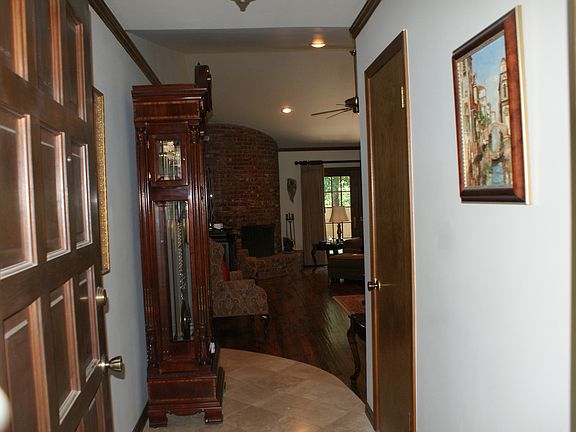 Entry with travertine flooring