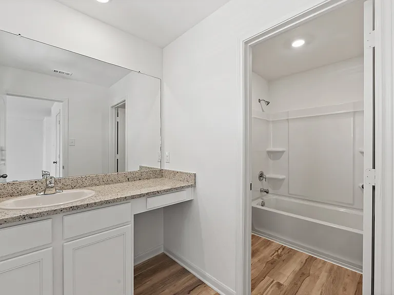 Spacious vanity in the walk-in closet.