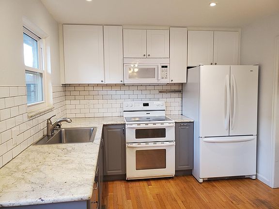 Bright kitchen with lots of storage.