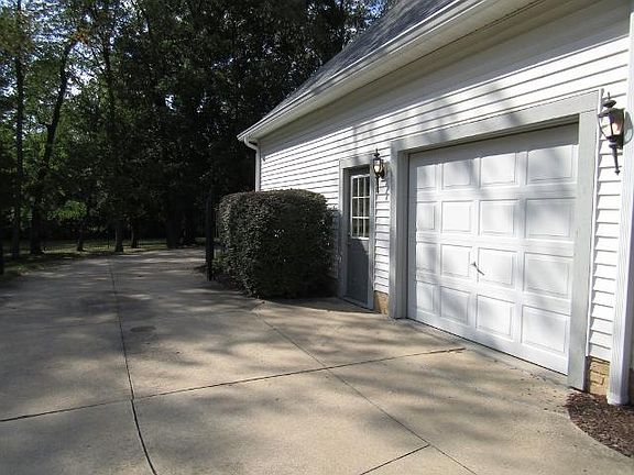 Third garage is on the side and ideal for the small car or other small vehicle.