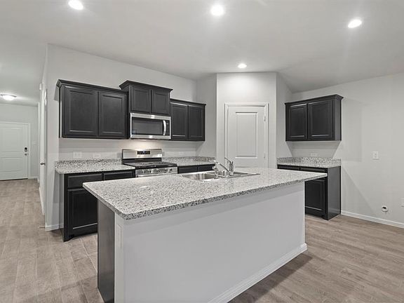 All photos shown here may not depict the specified home & features included are for illustration purposes only