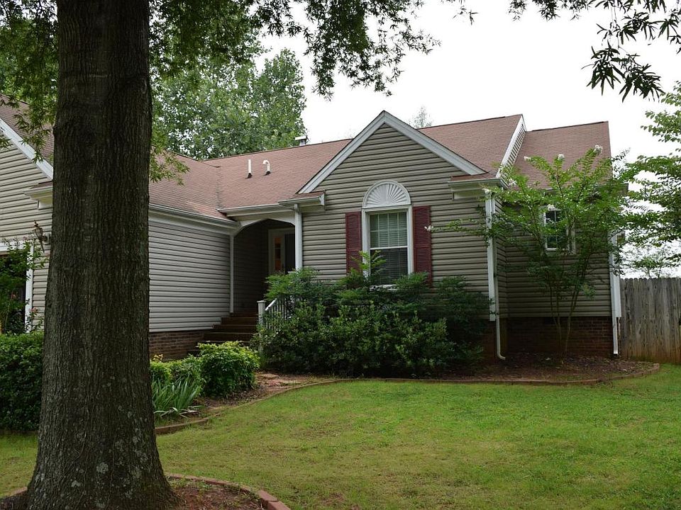 Front Of Home w/ Towering Oak Tree