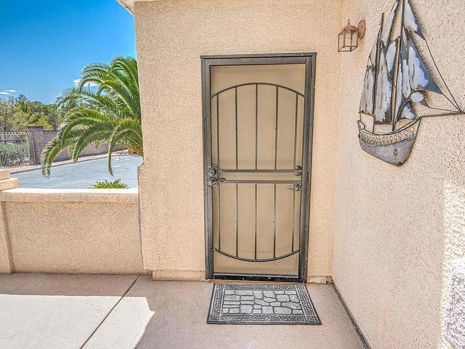 Front entrance to apartment, facing patio area for relaxing and enjoying front patio plants