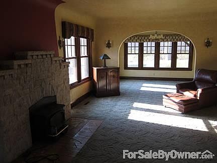 Living Room, Fireplace, and Sun Room