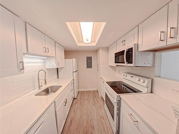 2nd image of 8335 Fairmount Drive Bldg 4 #102
