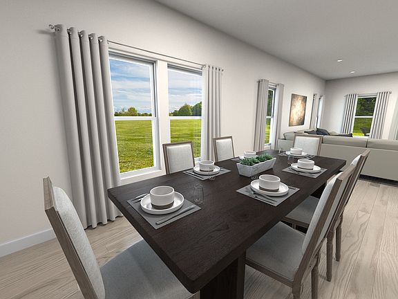 Dining area in the heart of the open-concept living space.