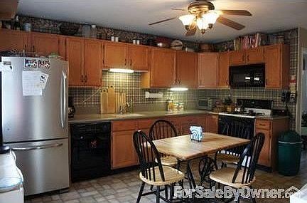 Cabinets Galore and Sliders to Deck
						:
						The HEART of your home. KIT w/ sliders to deck. So much cabinet & counter space!