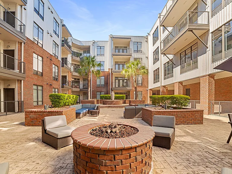 Courtyard with fire pit, grills, and seating