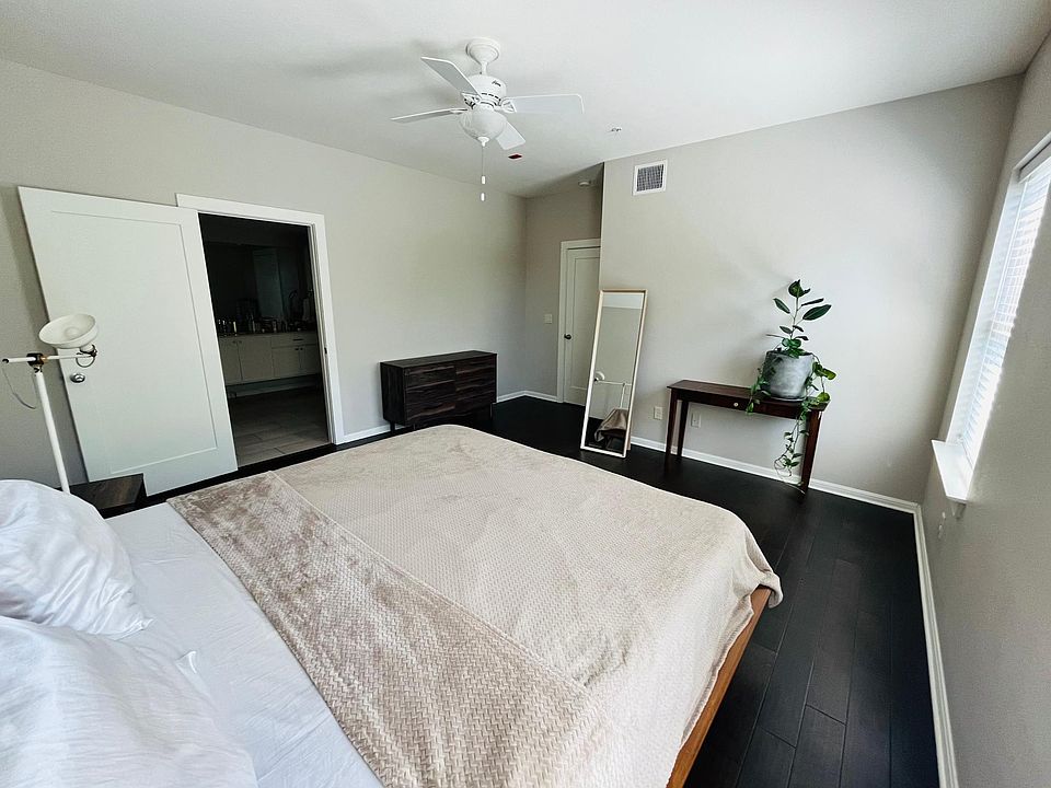 Master bedroom with ensuite bathroom and walk-in closet