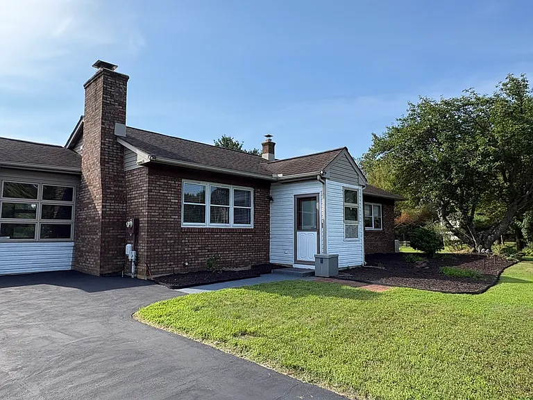 View of Front Vestibule & Re-Sealed Driveway