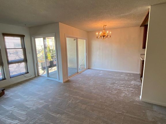 Dinning room and partial living room view