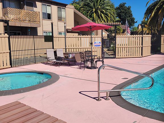 Pool & Spa Apt 61 is the upper balcony on the left, looking out at the pool area