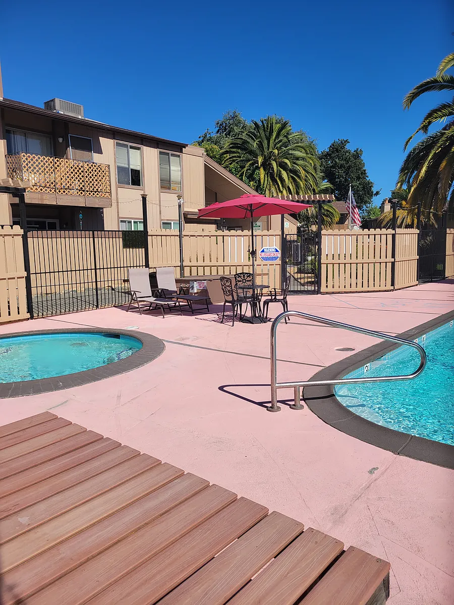 Pool & Spa looking out at the pool area. Pool is open May to Oct but the Jacuzzi spa is open all year round w/103 degrees - La Casa Novato