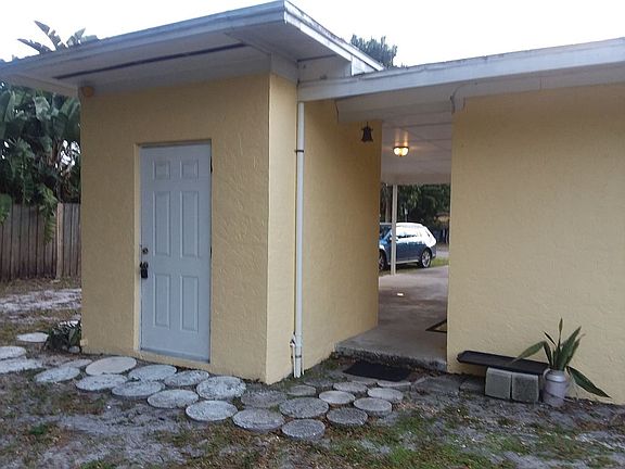 laundry behind carport