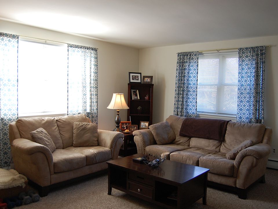 Spacious living room from entrance to apartment.