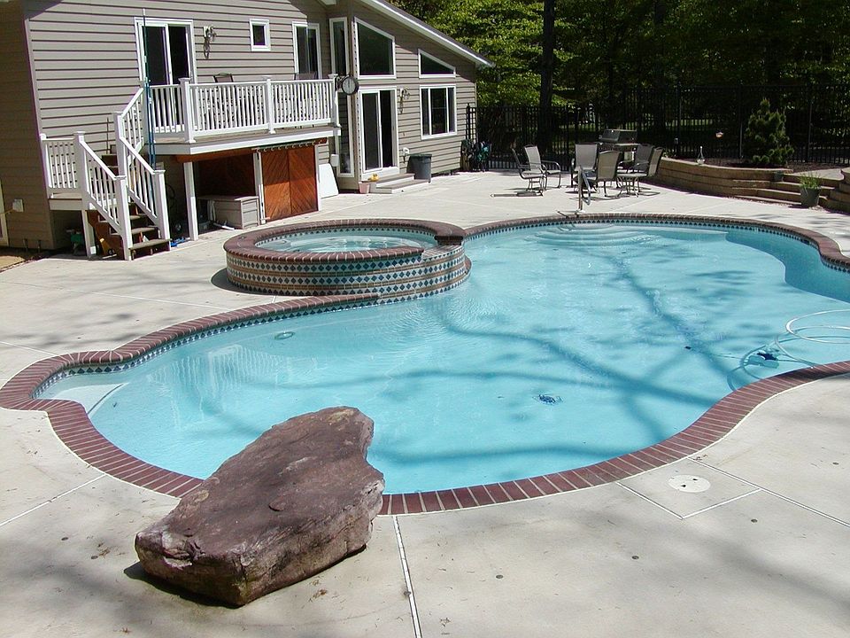 Custom pool and hot tub; dive rock