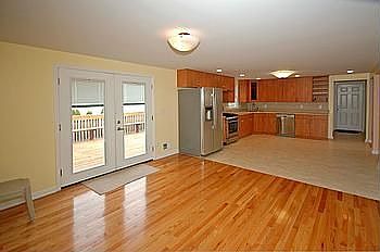 Family Room with sliders to private deck in the backyard