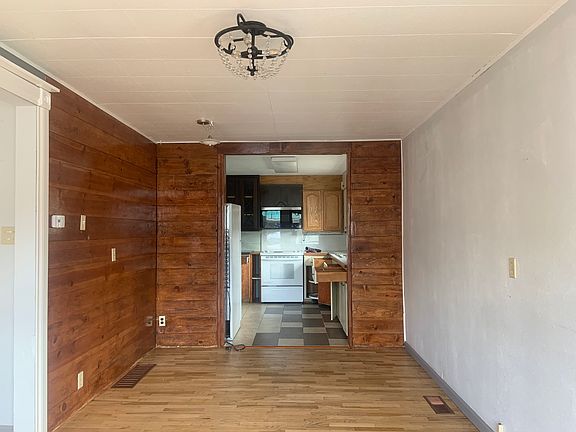 Open concept living, dining and kitchen.