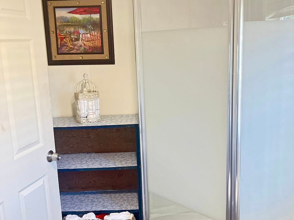 Storage galore in the Bathroom. Updated shower and vanity as well