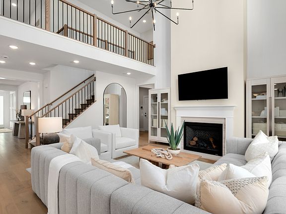 Sunlit Gathering Room with an Optional 2-Story Coffered Ceiling